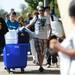 University of Michigan Move-In-Makers and friends and family help move in incoming freshman into Alice Lloyd Hall on Wednesday morning.  Melanie Maxwell I AnnArbor.com